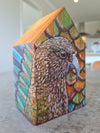 Kea and feathers birdhouse block